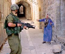 Israeli_Soldier_shooting_a_woman.jpg